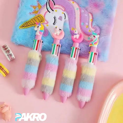 6-in-1 Fluffy Retractable Ballpoint Pen - Multicoloured Stationery item For School - Colorful pens with a unicorn design on a pink background, featuring the brand 'PAKRO'.