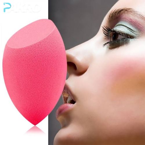 Pink makeup sponge next to a close-up of a woman applying makeup.