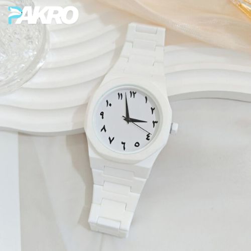 White watch with black Roman numerals on a white background, featuring the brand 'PAKRO'.