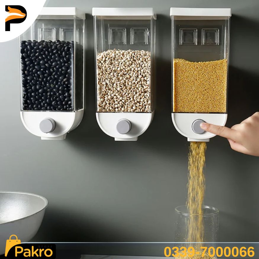 Three wall-mounted grain dispensers with a hand pouring yellow grains into a glass.