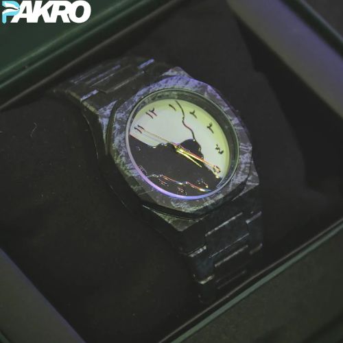 Wristwatch with digital display on a dark background, featuring the brand 'PAKRO'.