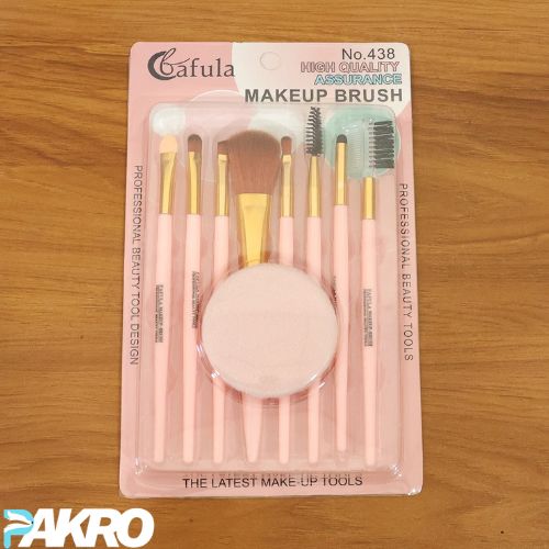 Packaged makeup brush set with Cafula branding on a wooden surface