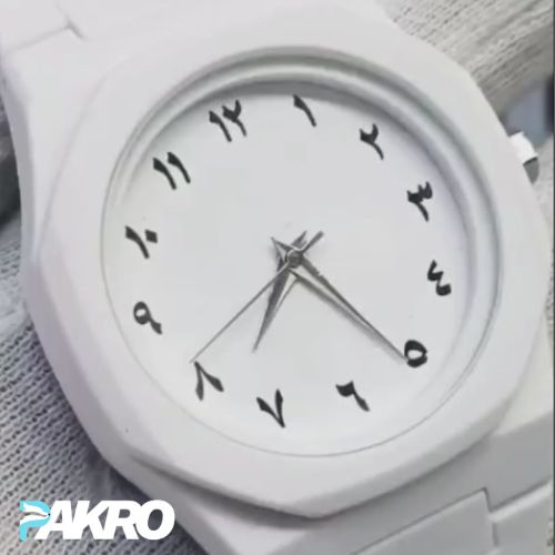 White watch with black Arabic numerals on a light gray background, featuring the brand 'PAKRO'.