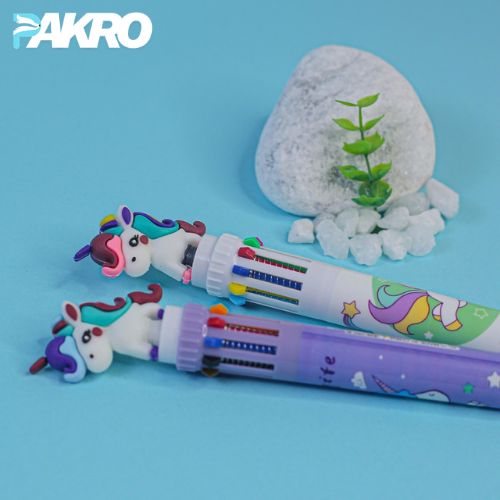 Unicorn-themed stationery set with colorful pens on a blue background, featuring the brand 'PAKRO'.