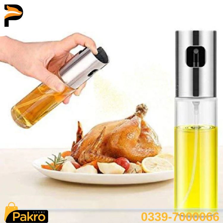 Olive oil sprayer being used on a roasted chicken with Pakro branding.