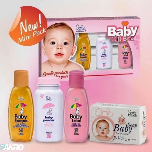Soft Touch Baby Care Large Gift Box Kit Pack Of 4 Baby Kit - Baby product gift set with bottles and a box on a pink background