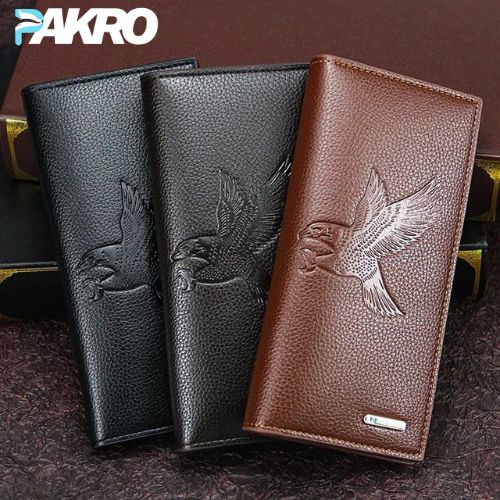 Three leather wallets in black and brown with embossed bird designs on a textured surface, featuring the brand 'PAKRO'.
