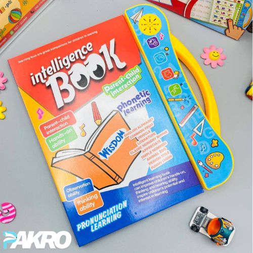 Children's educational book with colorful cover and 'PAKRO' branding on a gray surface.