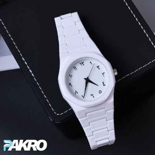 White wristwatch with black hands on a dark background, featuring the brand 'PAKRO'.