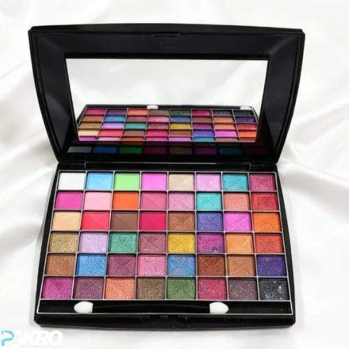 Makeup palette with colorful eyeshadows on a white background