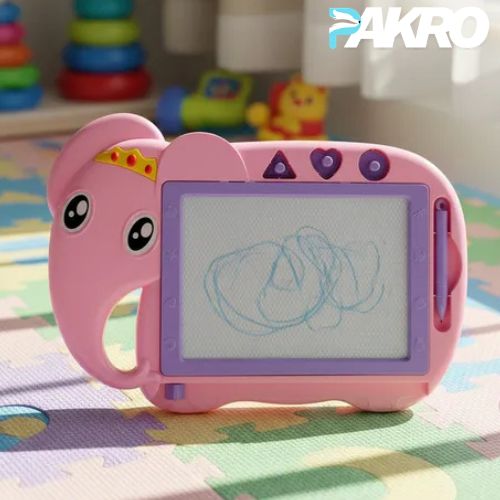 Pink elephant-shaped drawing board with a child's drawing on a colorful mat, brand 'PAKRO' visible.