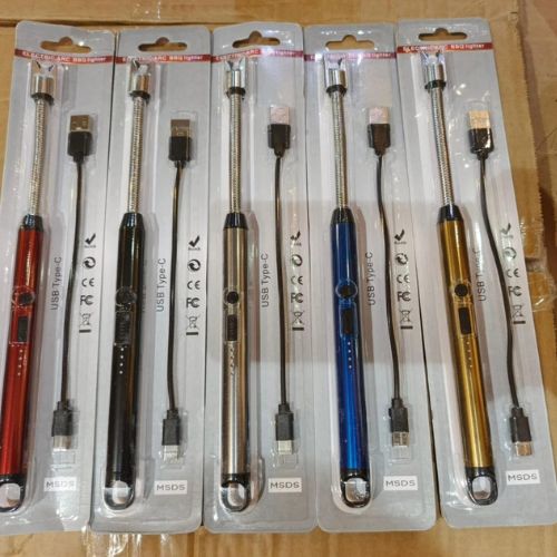 Set of electronic components in packaging on a wooden surface.  Rechargeable Electric USB Lighter with Flexible Neck