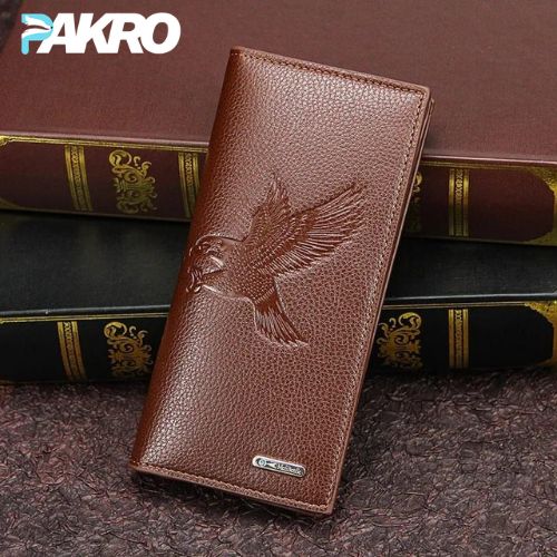 Brown leather wallet with eagle embossing on a textured surface, featuring the brand 'PAKRO'.