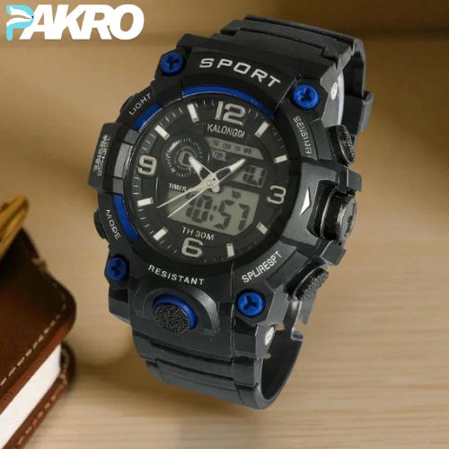 Black and blue sports watch with digital and analog display on a wooden surface, brand 'PAKRO' visible.