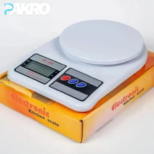 Electronic kitchen scale on top of its packaging box with 'PAKRO' branding.