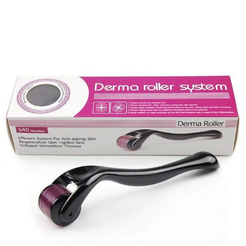 Derma roller system with packaging on a white background