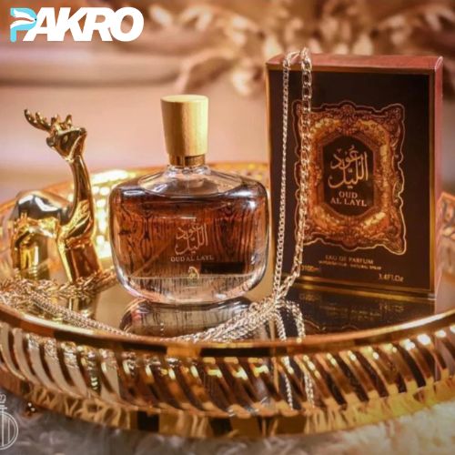 Arabiyat Oud Al Layl Eau De Parfum For Unisex, 100 ml - Perfume bottle and packaging on a decorative tray with 'PAKRO' branding.