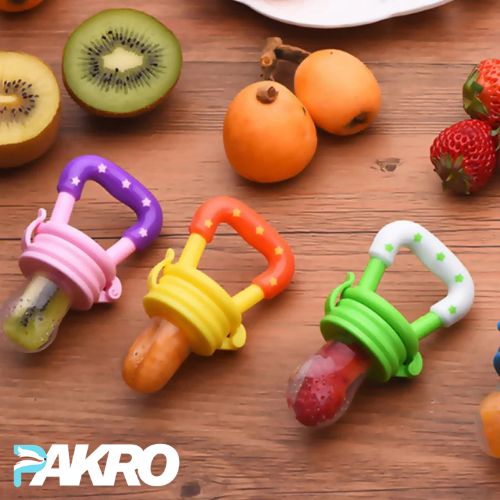 Colorful baby teething toys with fruits on a wooden surface, featuring the brand 'PAKRO'.  Baby Fruit Pacifier Infant Nipple Food Feeder