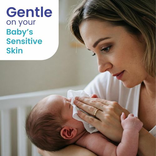Woman holding a baby with a product label indicating 'Gentle on your Baby's Sensitive Skin'.