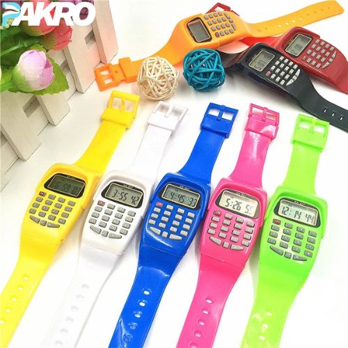 Colorful calculator watches with different colored straps on a white background, featuring the brand 'PAKRO'.